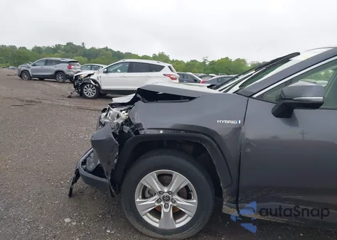 2021 Toyota Rav4 Hybrid Xle from USA, damaged, VIN JTMRWRFV6MD127279